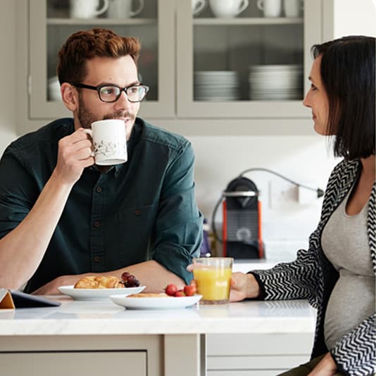 Couple having breakfast together